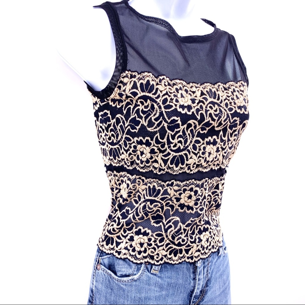 Sophisticated Cache sleeveless top